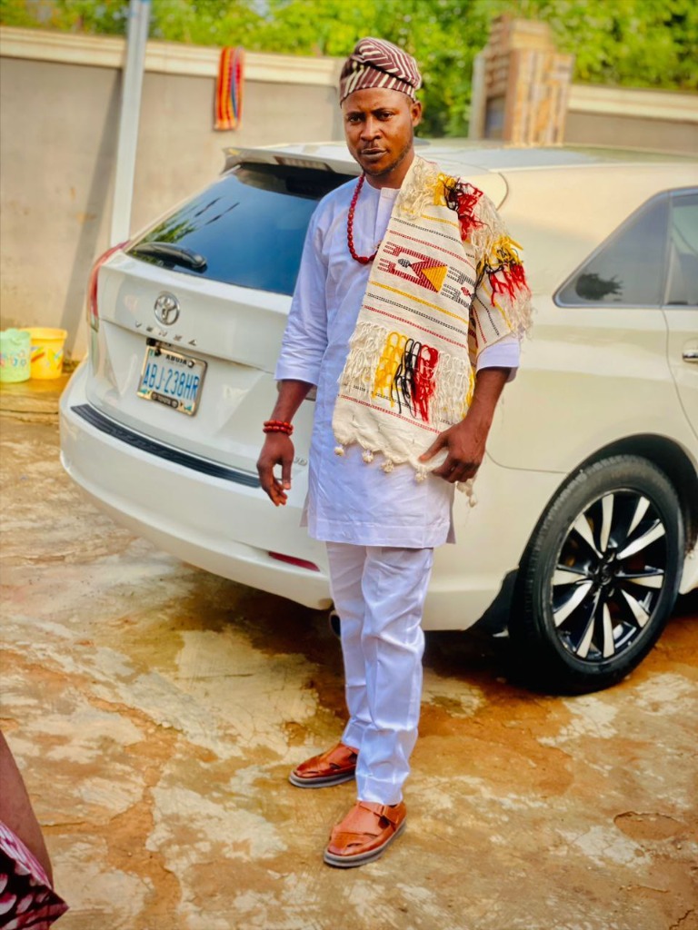 Babalawo in white traditional attire